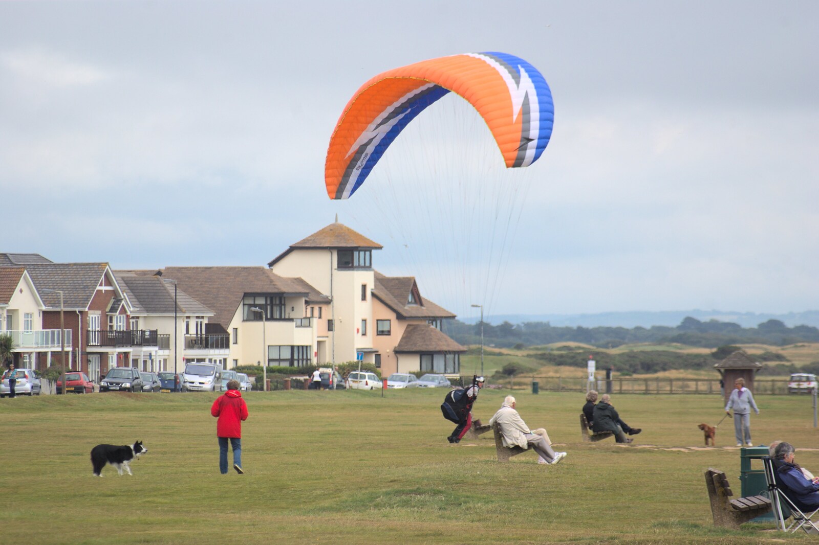 A parasailer lands on the clifftop from A Camper Van Odyssey: Oxford, Salisbury, New Forest and Barton-on-Sea - 19th June 2011