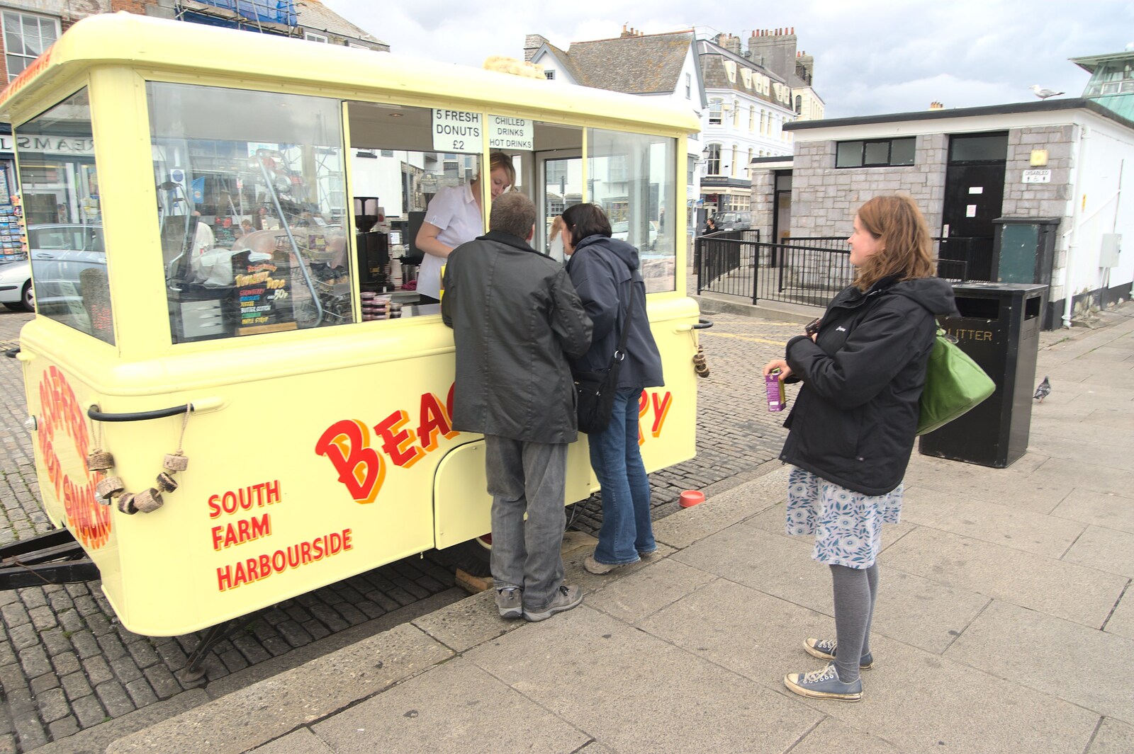 Isobel queues up for doughnuts from A Camper Van Odyssey: Charmouth, Plymouth, Dartmoor and Bath - 20th June 2011