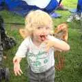 Fred eats something chocolatey, A Camper Van Odyssey: Charmouth, Plymouth, Dartmoor and Bath - 20th June 2011