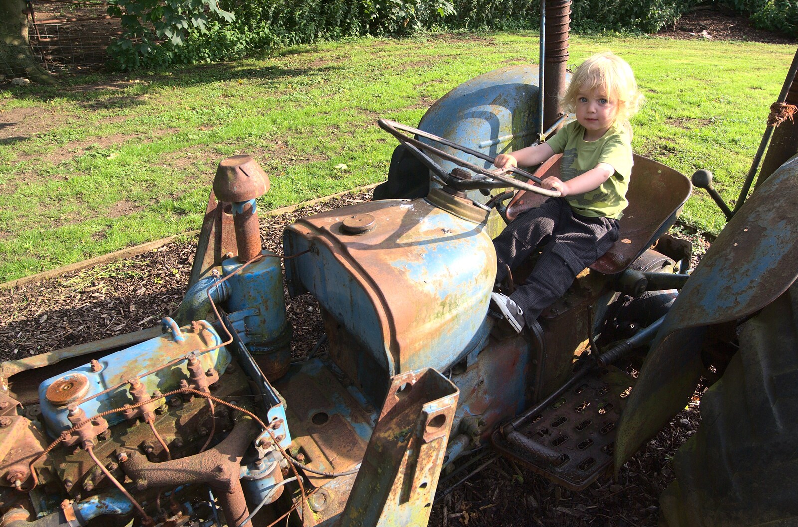 Fred on an ancient tractor from Thrandeston Pig, Little Green, Thrandeston, Suffolk - 26th June 2011