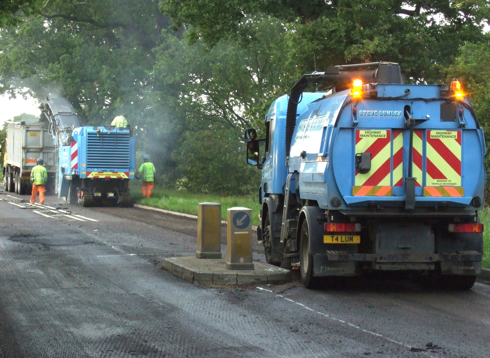 A road sweeper cleans up from Paella and Roadworks, Brome, Suffolk - 9th July 2011