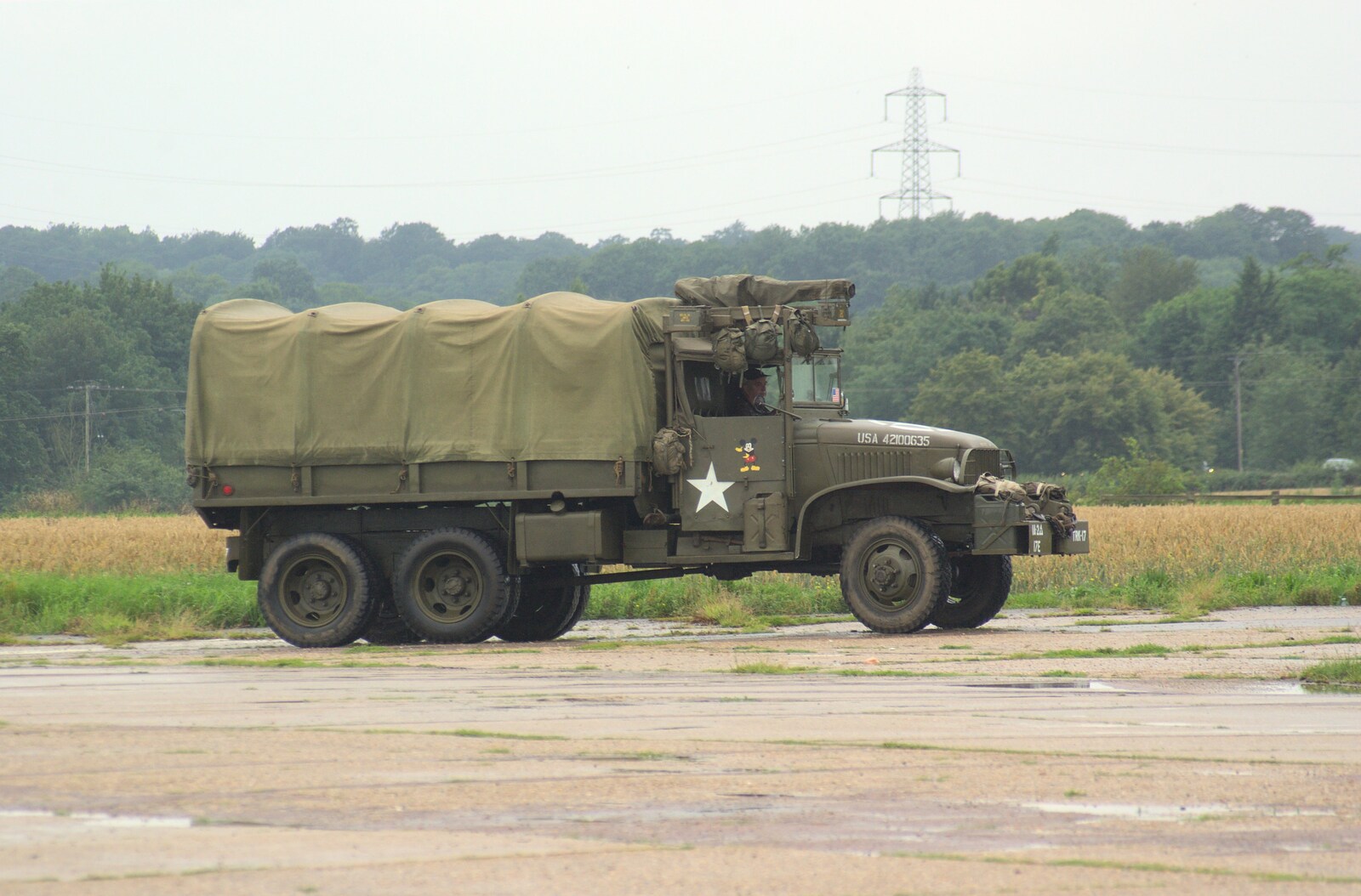 The first truck trundles on to the runway from Clive's Military Vehicle Convoy, Brome Aerodrome, Suffolk - 16th July 2011