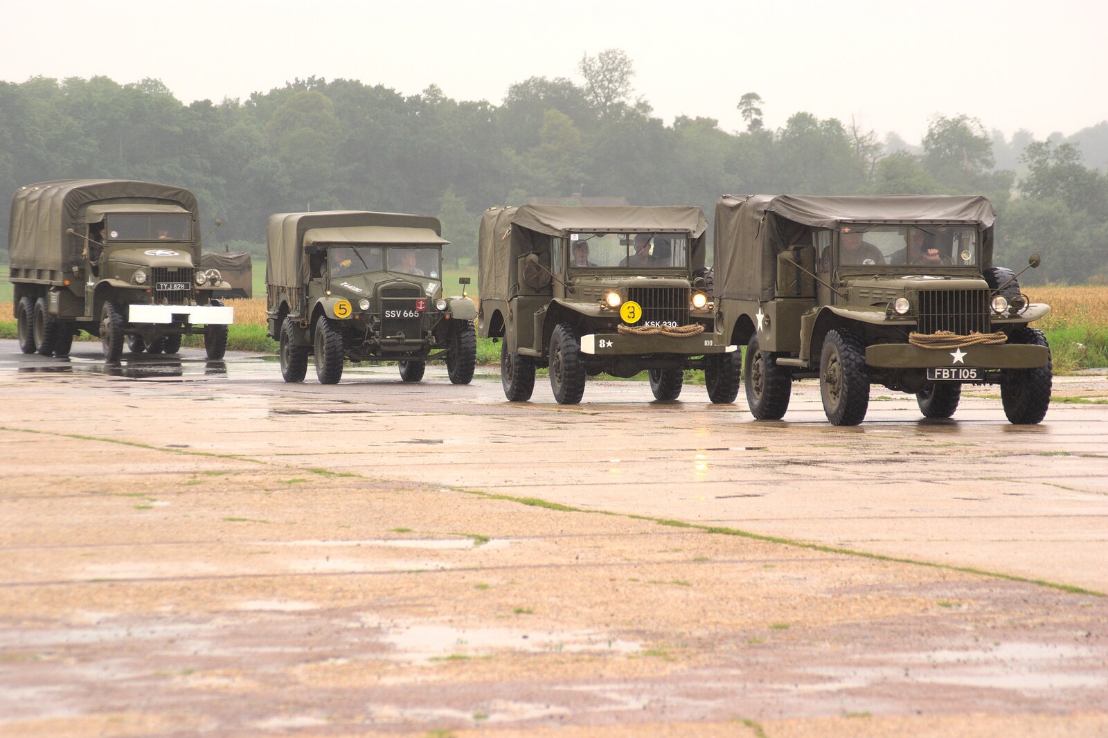 Trucks and Jeeps trundle on to the airfield from Clive's Military Vehicle Convoy, Brome Aerodrome, Suffolk - 16th July 2011