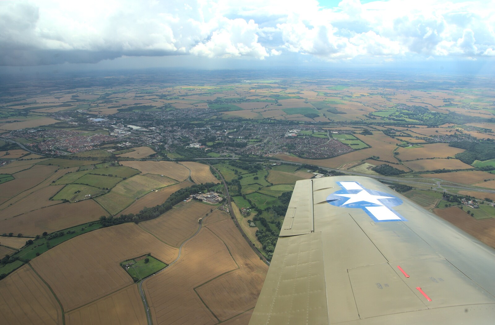 Flying past Stowmarket from Nosher Flies in a P-51D Mustang, Hardwick Airfield, Norfolk (and the Whole of Suffolk) - 17th July 2011