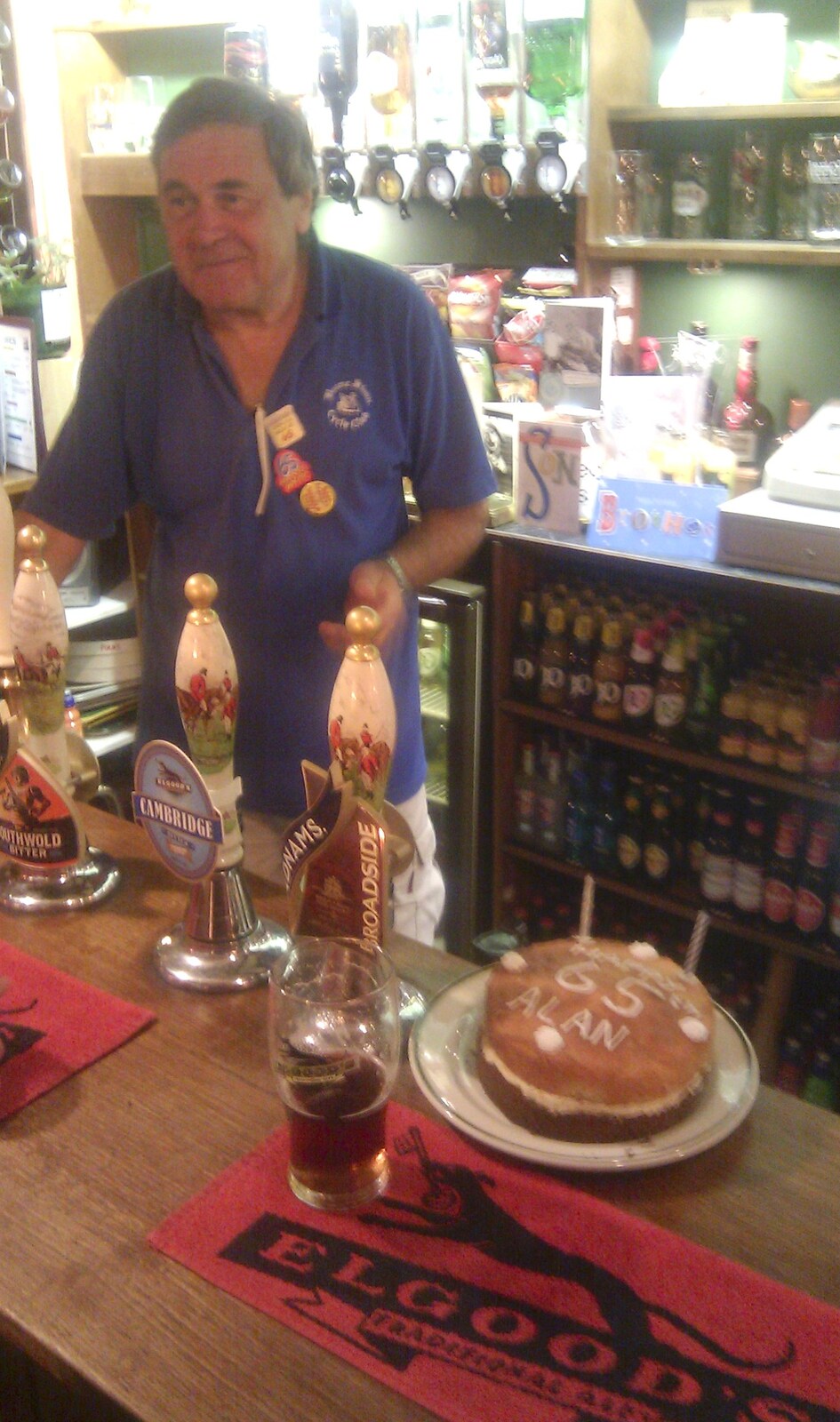 Alan behind the bar from Barbeque at the Swan Inn, Brome, Suffolk - 5th August 2011