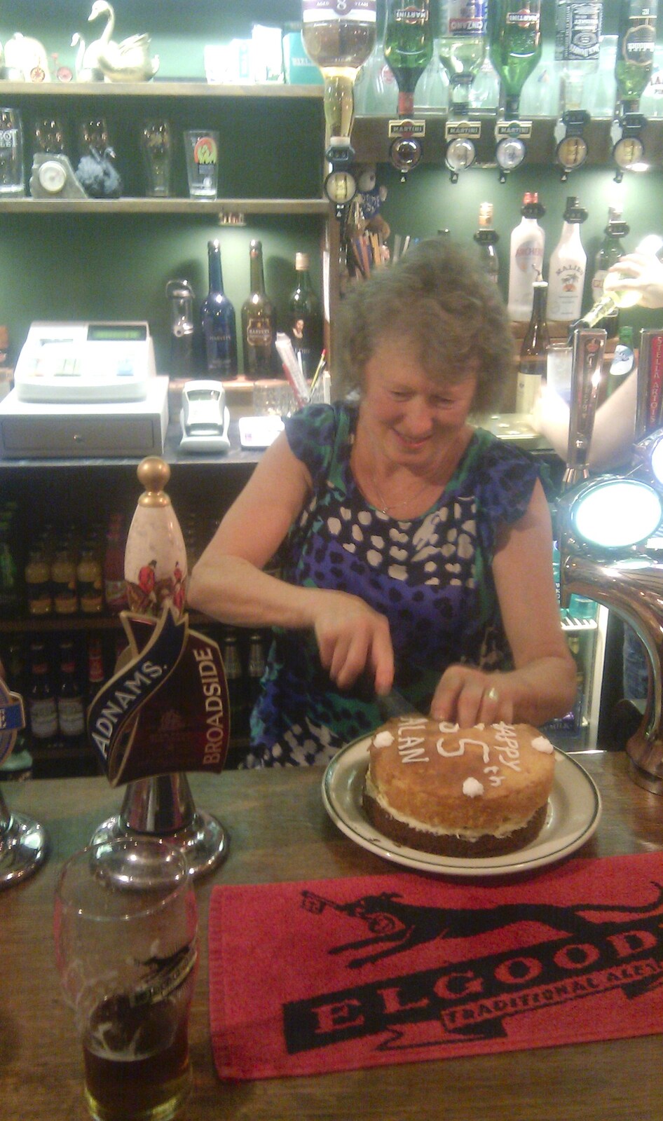 Sylvia cuts the cake from Barbeque at the Swan Inn, Brome, Suffolk - 5th August 2011