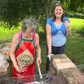 Sylvia and Claire are on barbeque duty, Barbeque at the Swan Inn, Brome, Suffolk - 5th August 2011