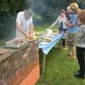 Alan helps to serve up, Barbeque at the Swan Inn, Brome, Suffolk - 5th August 2011