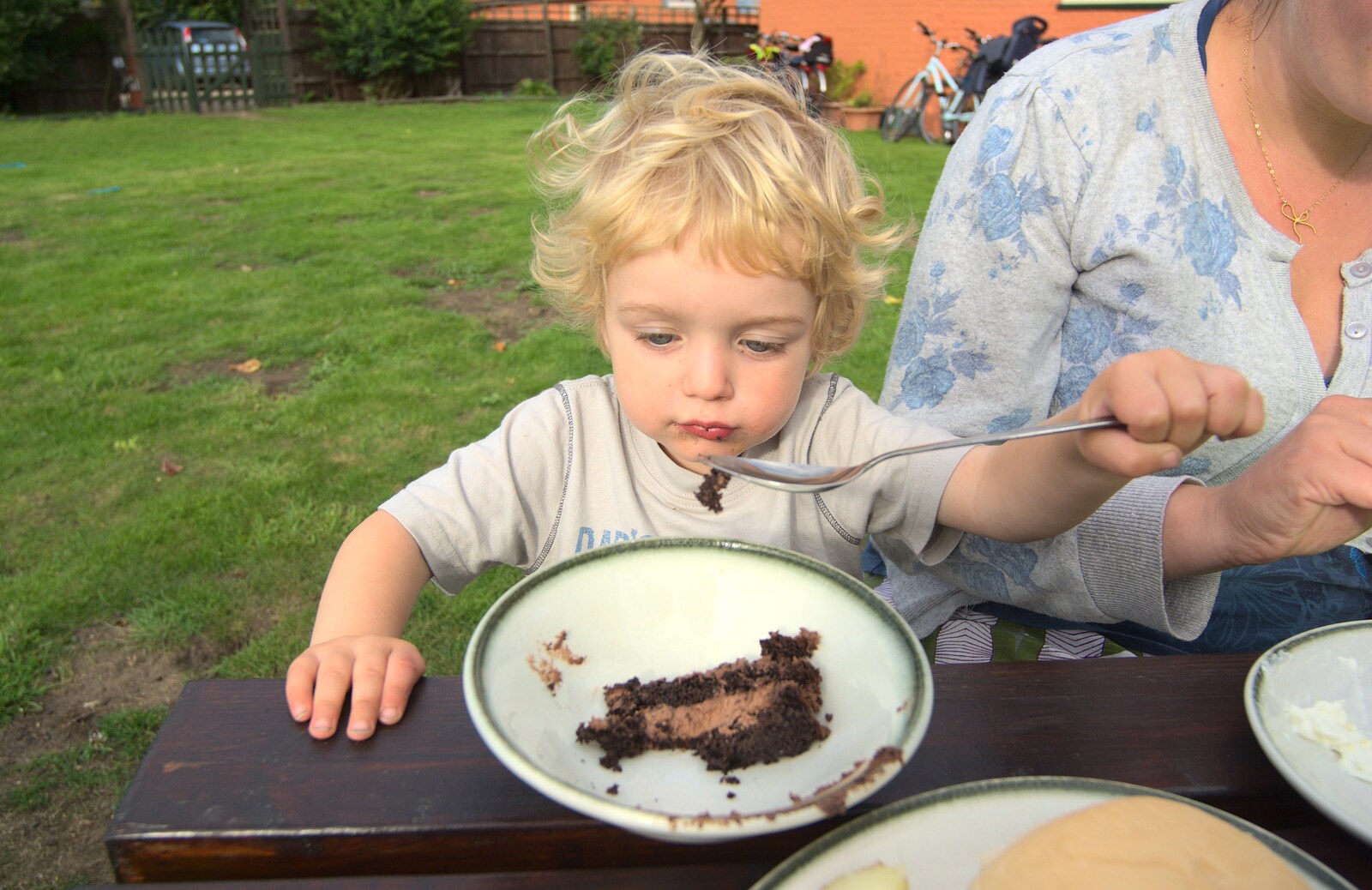 Fred considers some chocolate cake from Barbeque at the Swan Inn, Brome, Suffolk - 5th August 2011
