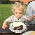 Fred considers some chocolate cake, Barbeque at the Swan Inn, Brome, Suffolk - 5th August 2011