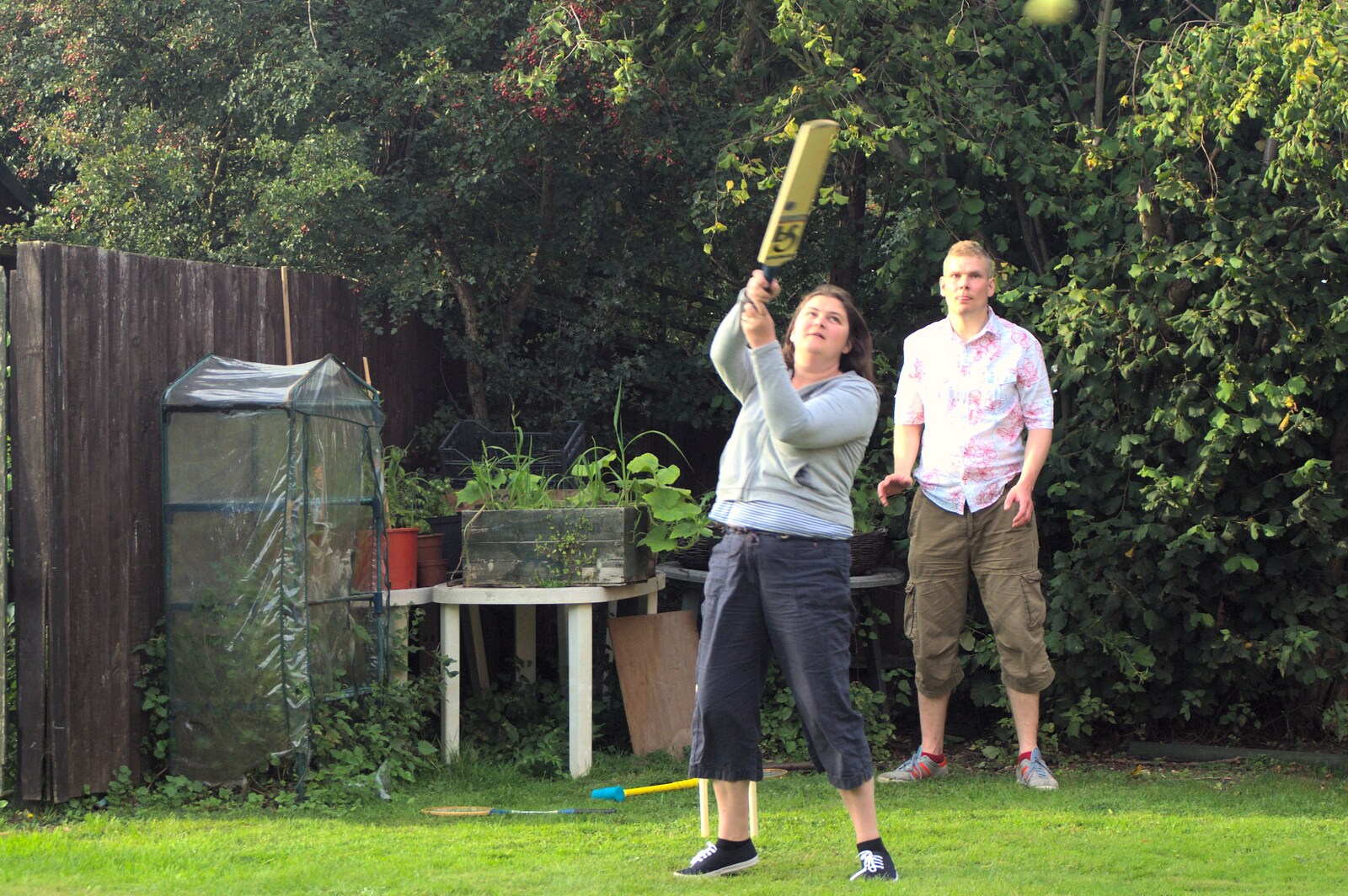 Claire lobs the ball up for a six from Barbeque at the Swan Inn, Brome, Suffolk - 5th August 2011