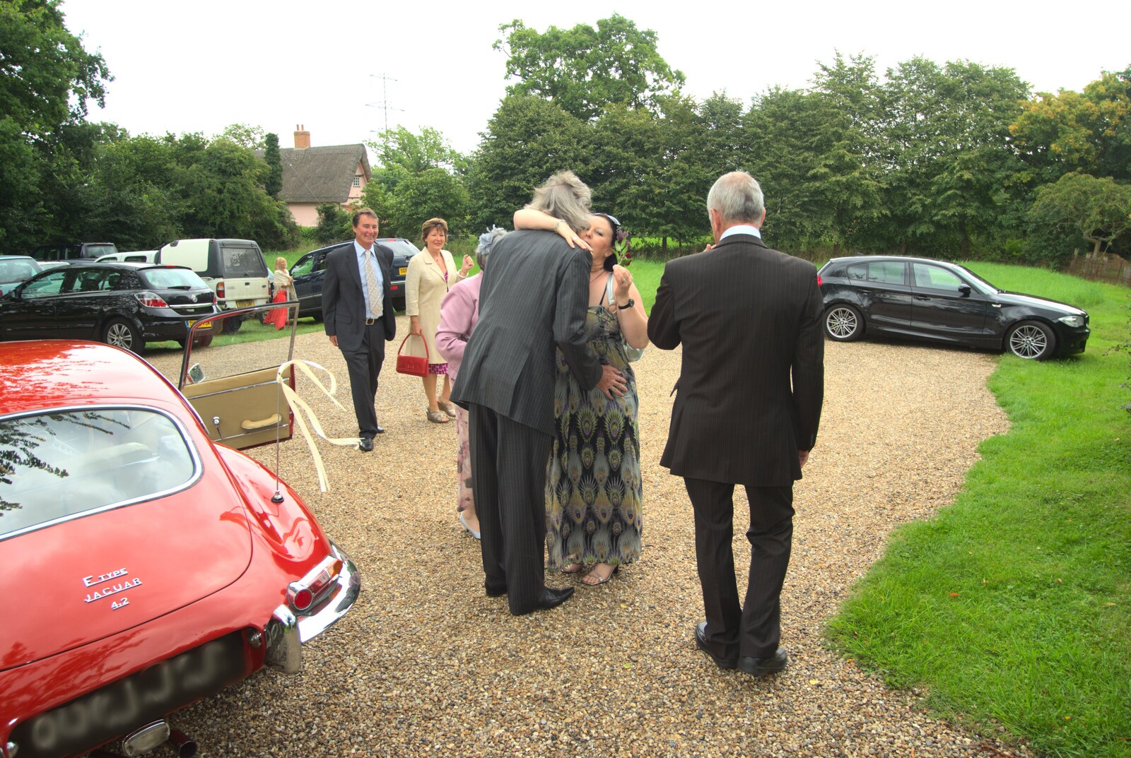 Rob greets some more guests from Rob and Wilma's Wedding, Thornham and Thrandeston, Suffolk - 6th August 2011