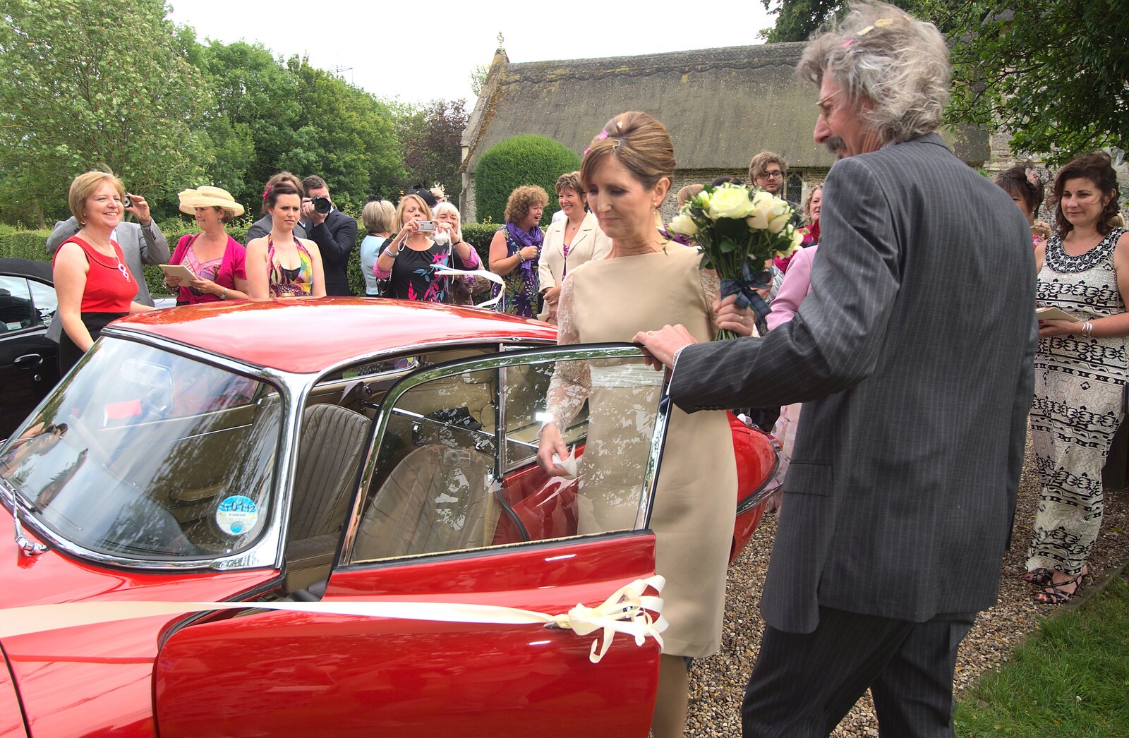Wilma gets in the Jag from Rob and Wilma's Wedding, Thornham and Thrandeston, Suffolk - 6th August 2011