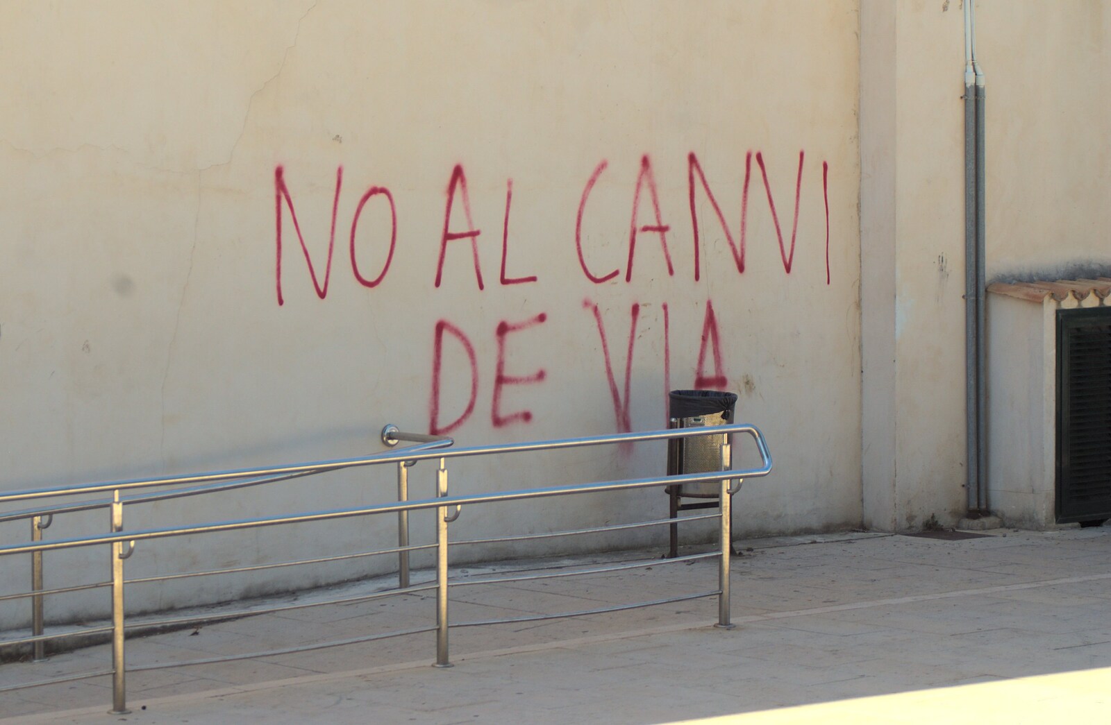 Some sort of protest graffiti on a wall from A Tram Trip to Port Soller, Mallorca - 18th August 2011