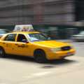 A New York cab steams across an intersection, A Manhattan Hotdog, New York, USA - 21st August 2011