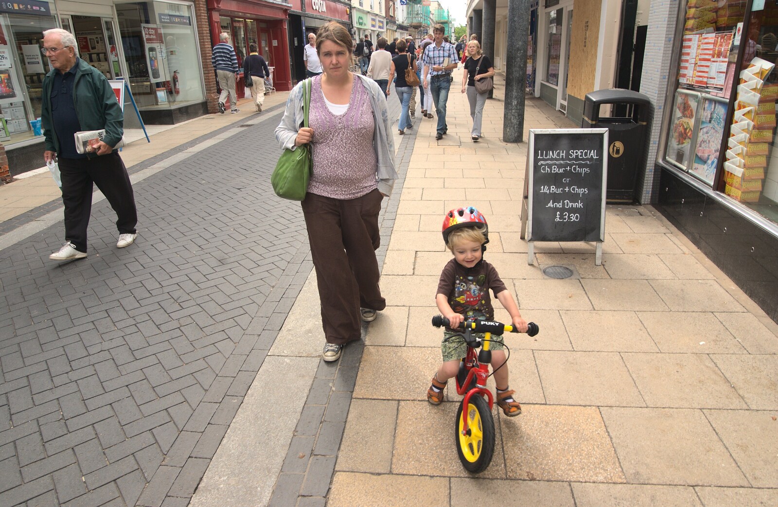 Fred trundles up Mere Street on his new bike from Railway Graffiti, Fred's Balance Bike, and Lydia Visits - London and Brome, Suffolk, 24th August 2011