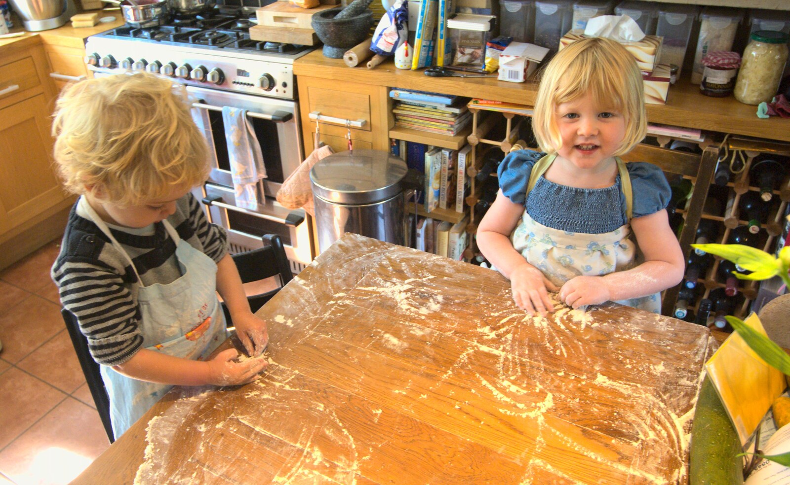 Fred and Lydia mess around in flour from Railway Graffiti, Fred's Balance Bike, and Lydia Visits - London and Brome, Suffolk, 24th August 2011