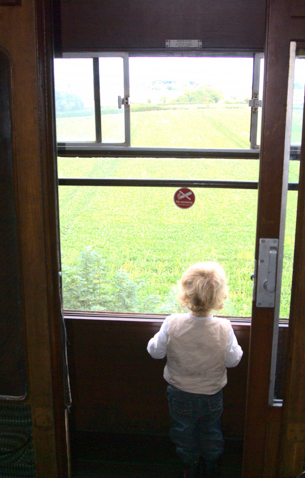Fred looks out of the carriage window from The 1940s Steam Train Weekend, Holt, Norfolk - 18th September 2011