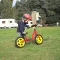 Fred picks up his balance bike, Fred's Birthday and Mildenhall Camping, Suffolk - 25th September 2011