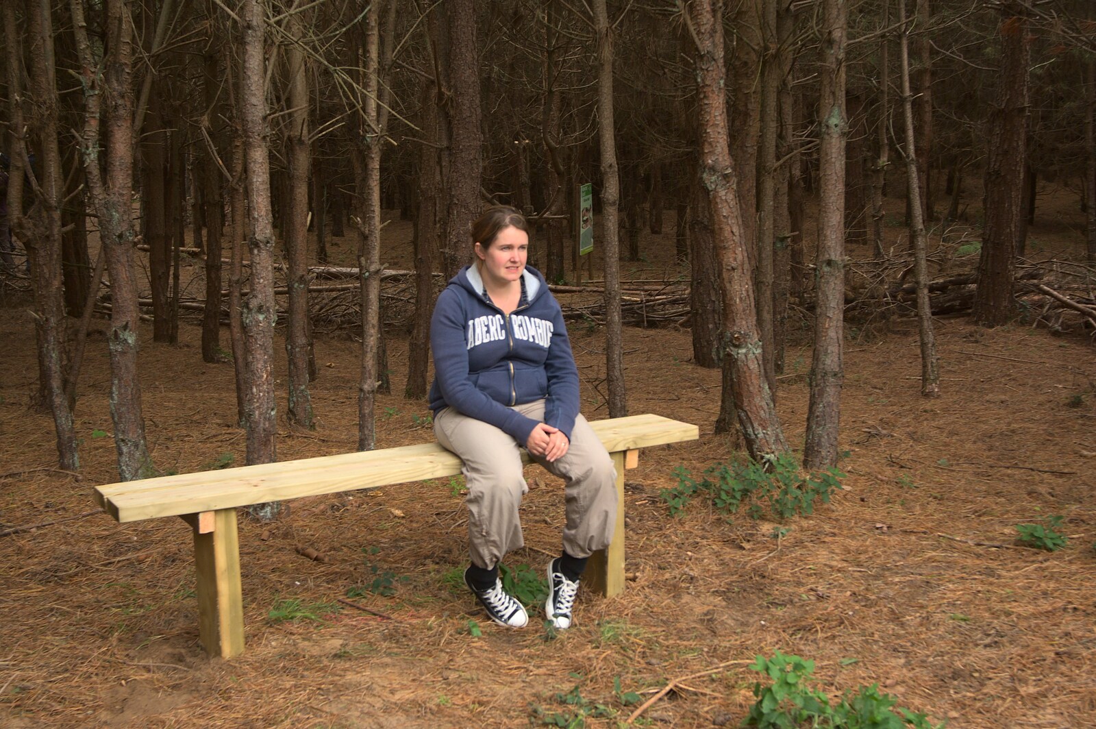 Isobel sits on a bench and ponders from Fred's Birthday and Mildenhall Camping, Suffolk - 25th September 2011