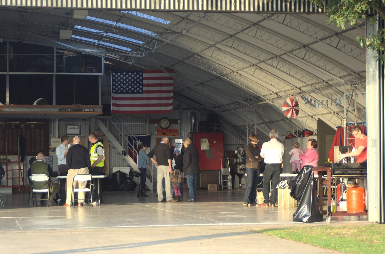 People mill around in the hangar from Another Afternoon with Janie and Marinell the Mustangs, Hardwick, Norfolk - 16th October 2011