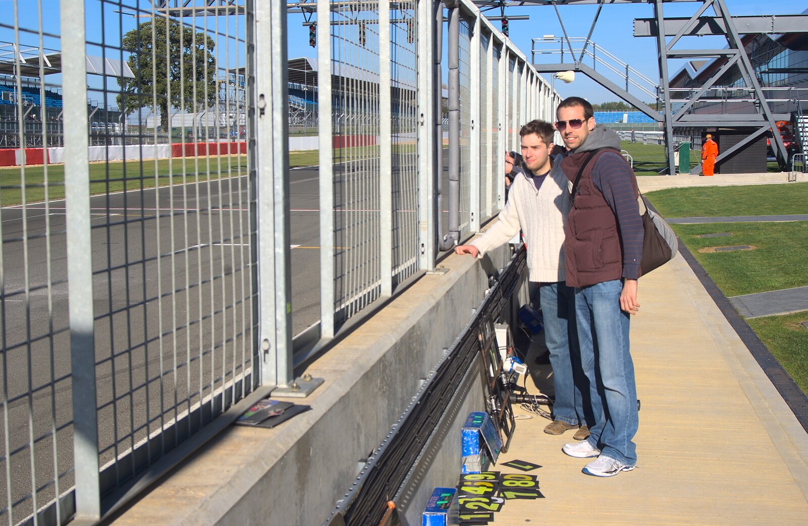 Doug and Ben wait by the 'debris wall' from TouchType at Silverstone, Northamptonshire - 22nd October 2011