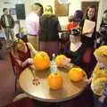 Allyson and Ellie carve pumpkins as Fred watches, Amelia's Birthday, Brome Village Hall, Suffolk - 29th October 2011