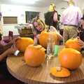 More intense pumpkin-carving action, Amelia's Birthday, Brome Village Hall, Suffolk - 29th October 2011