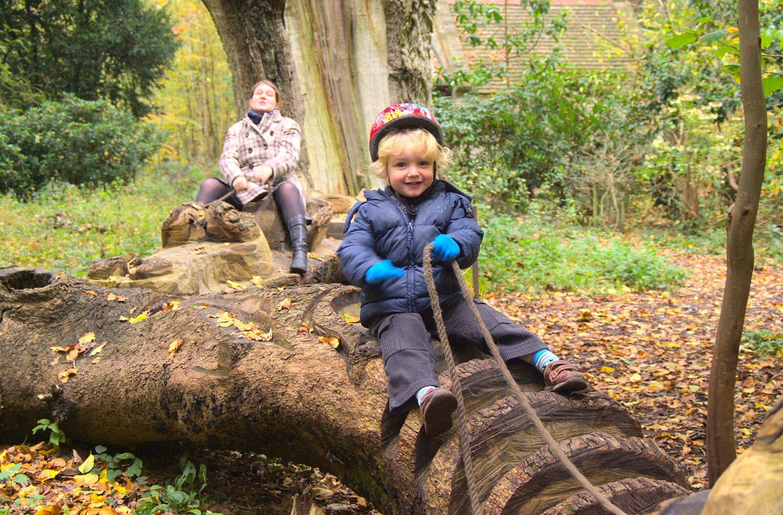 Isobel and Fred ride the wooden dragon from Autumn in Thornham Estate, Thornham, Suffolk - 6th November 2011