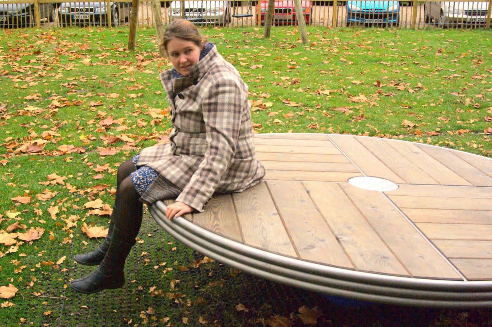 Isobel on a roundabout from Autumn in Thornham Estate, Thornham, Suffolk - 6th November 2011