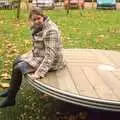 Isobel on a roundabout, Autumn in Thornham Estate, Thornham, Suffolk - 6th November 2011