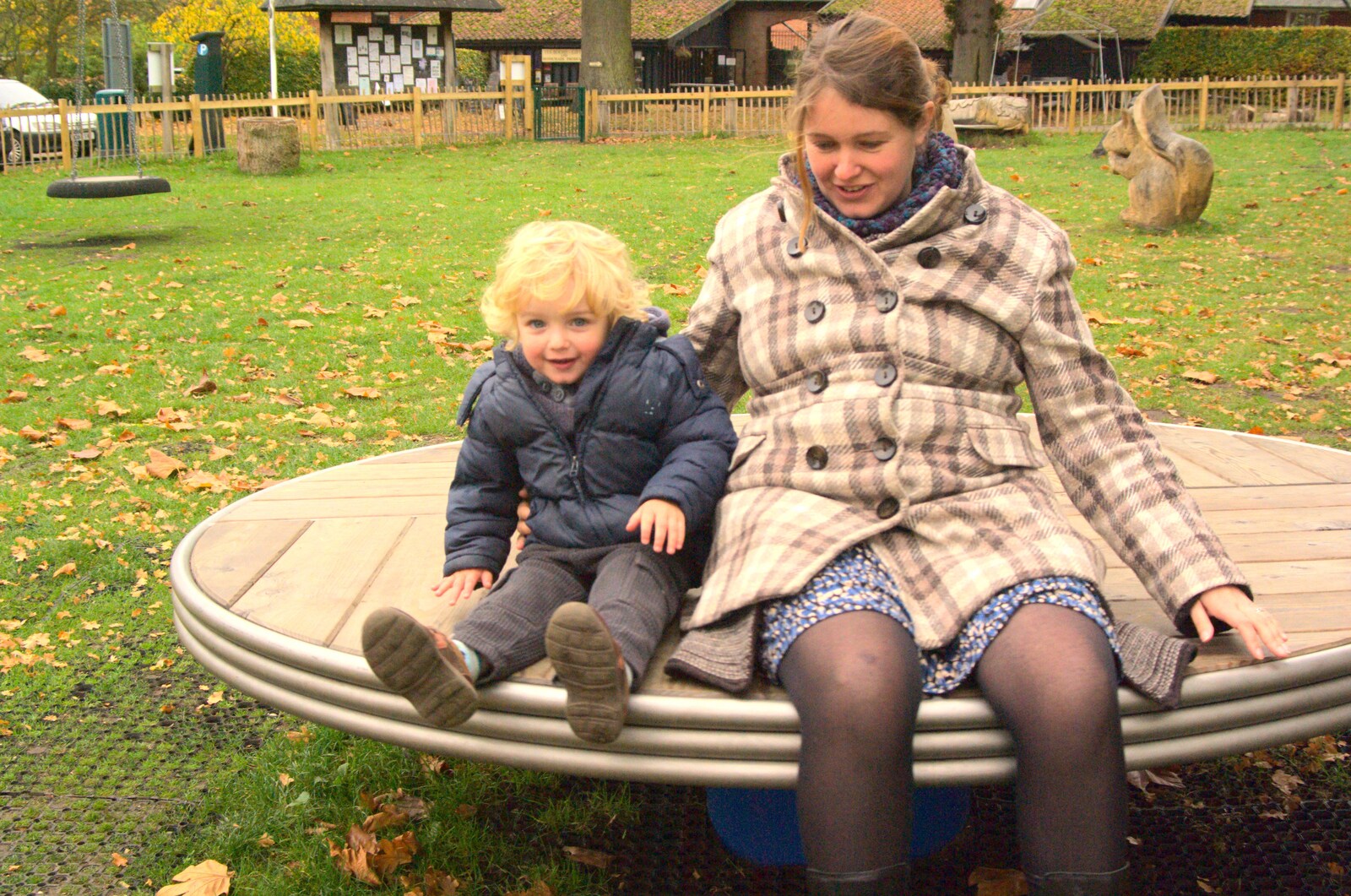 Fred and Isobel spin round from Autumn in Thornham Estate, Thornham, Suffolk - 6th November 2011