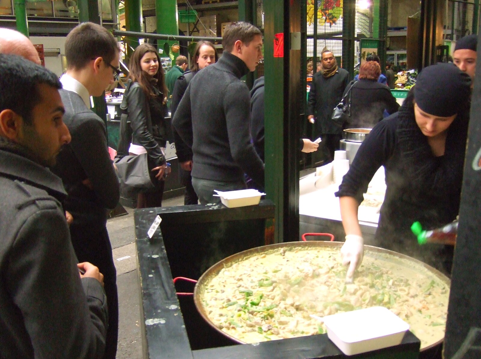 A huge pile of green curry in a paellera from TouchType does Nandos, Southwark Arches, London - 29th November 2011