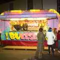 Girls hang around by a fairground stall, The Christmas Lights Switch-On, Eye, Suffolk - 2nd December 2011