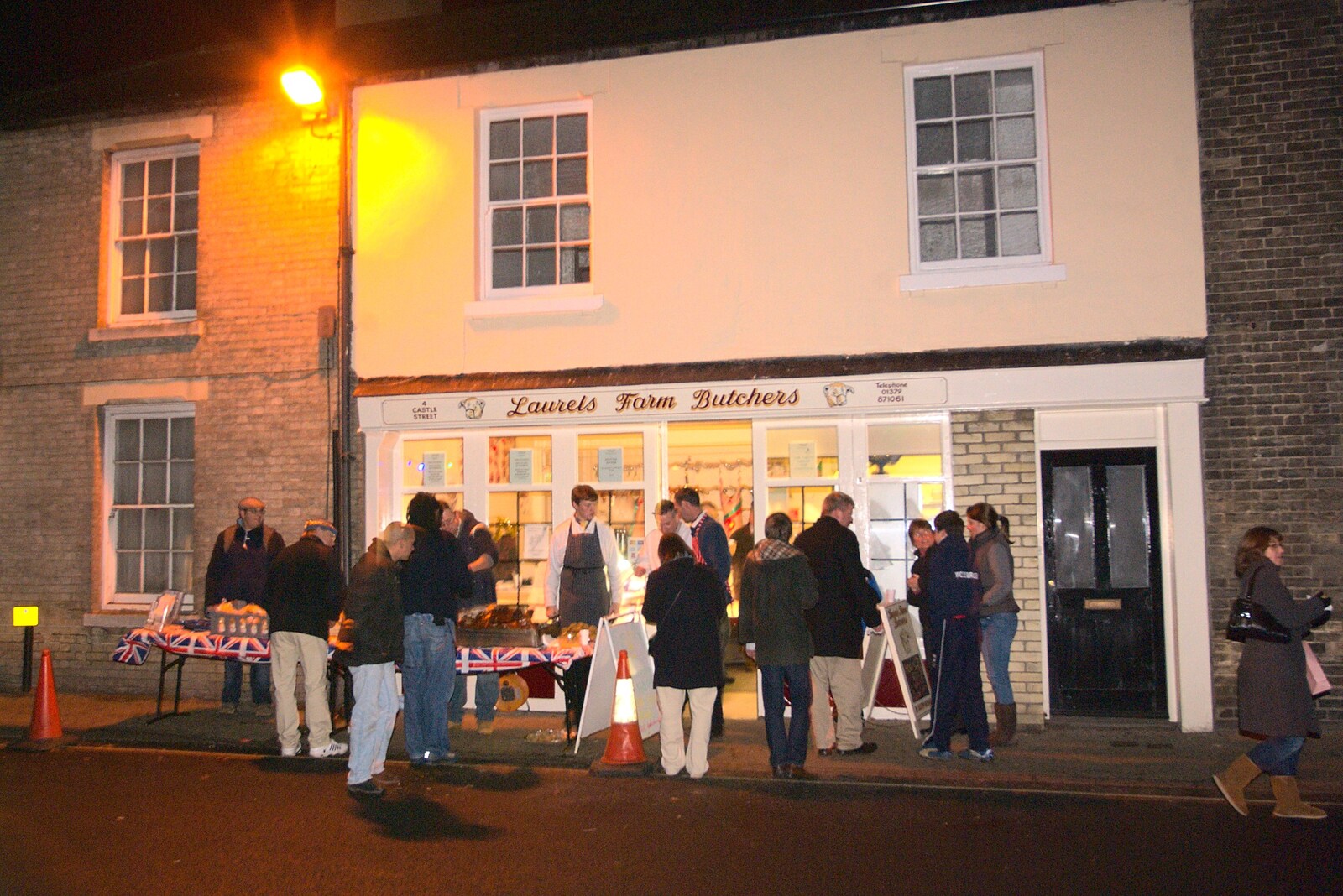 Laurels Farm butchers do a charity hog roast from The Christmas Lights Switch-On, Eye, Suffolk - 2nd December 2011