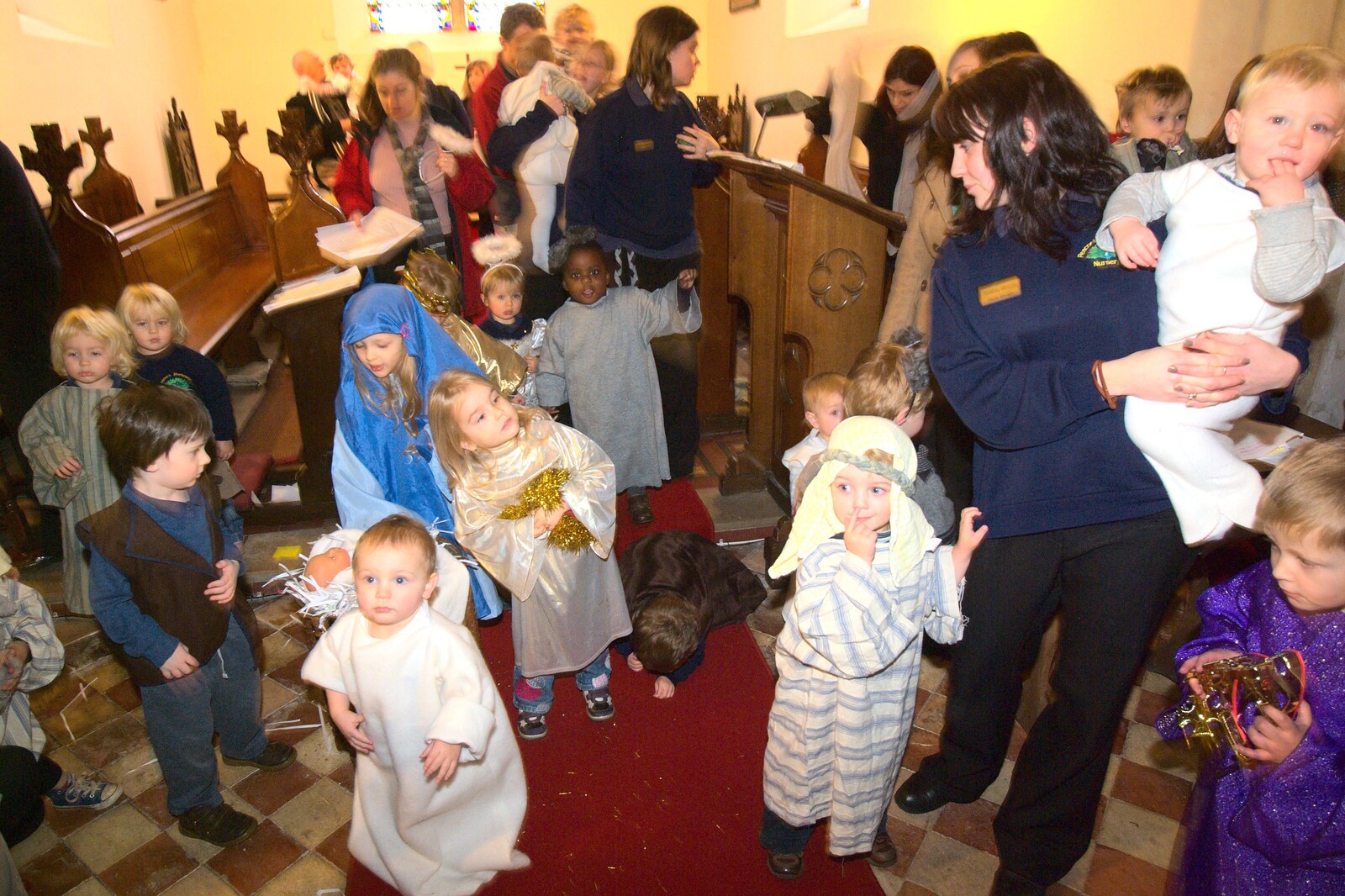 Fred hangs on to Jemma from Fred's First Nativity, St. Peter's Church, Palgrave, Suffolk - 8th December 2011