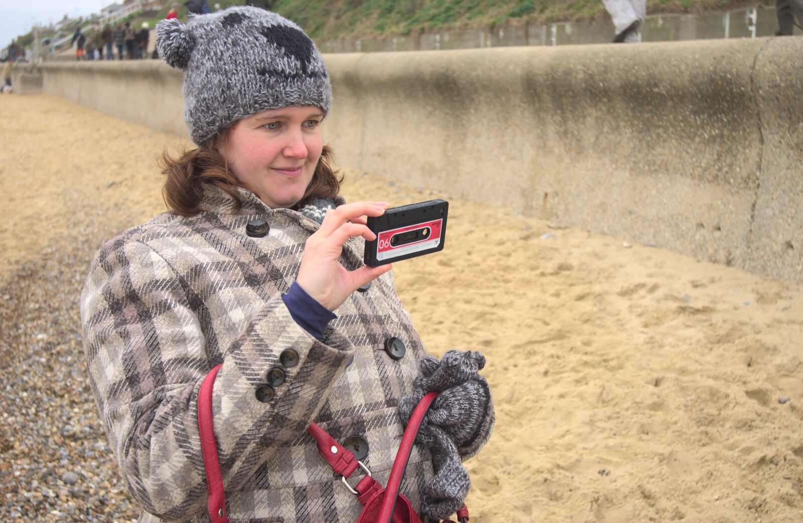 Isobel takes a photo from A Boxing Day Walk, and a Trip to the Beach, Thornham and Southwold, Suffolk - 26th December 2011