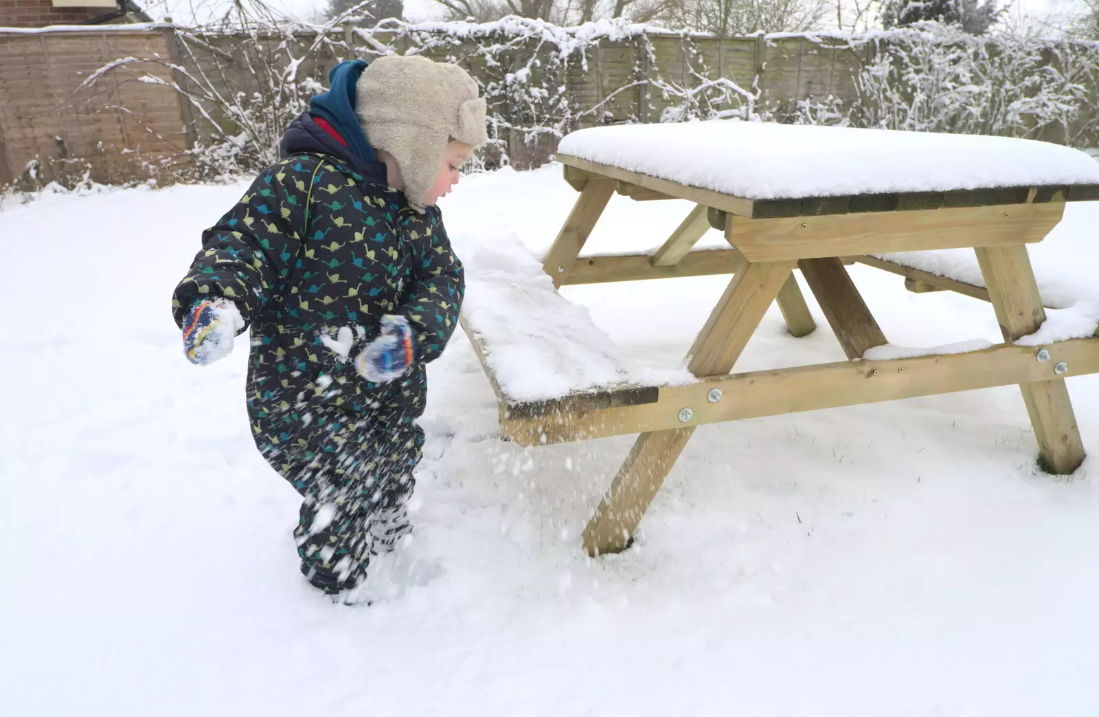 Fred does a bit of clearing, from A Snowy February Miscellany, Suffolk - 7th February 2012