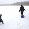 Fred and Isobel venture off across the side field, A Snowy February Miscellany, Suffolk - 7th February 2012