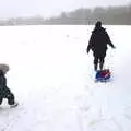 Fred and Isobel venture off across the side field, A Snowy February Miscellany, Suffolk - 7th February 2012