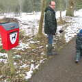 Matt by the dog-poo bin, Winter Walks with Sis and Matt, Brome and Thornham, Suffolk - 11th February 2012