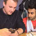 Chet watches something on Joe's phone, TouchType does Wagamama, South Bank, London - 6th March 2012