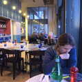 Isobel scopes out the pizza list in Pizza Express, Walking the Cat, Brome, Suffolk - 19th March 2012