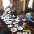 The BSCC Cycling Weekend, The Swan Inn, Thaxted, Essex - 12th May 2012, Paul pours coffee as Fred grabs his Lego