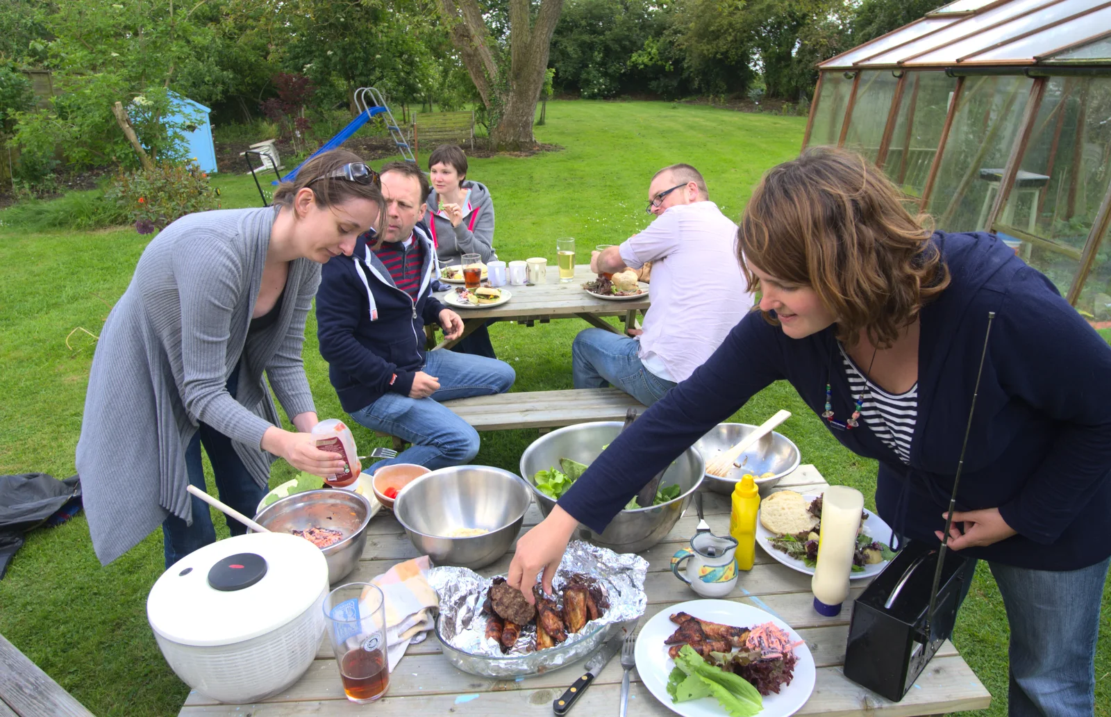 A barbeque occurs, from The Queen's Diamond Jubilee Weekend, Eye and Brome, Suffolk - 4th June 2012