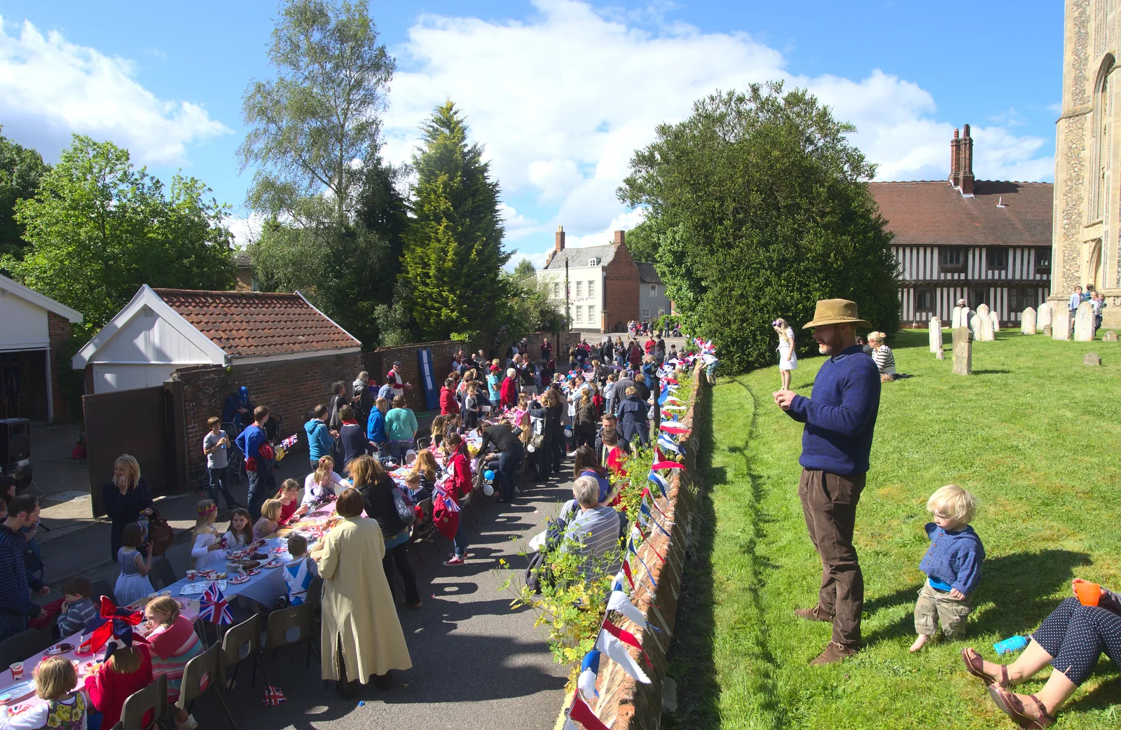 People watch from up in the churchyard, from The Queen's Diamond Jubilee Weekend, Eye and Brome, Suffolk - 4th June 2012