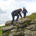 Isobel scrambles up a rock, Chagford and Haytor, Dartmoor, Devon - 11th June 2012