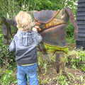 Fred pokes at the cow sculpture, Grandad's Gaff and Music in the Park, Diss, Norfolk - 16th June 2012