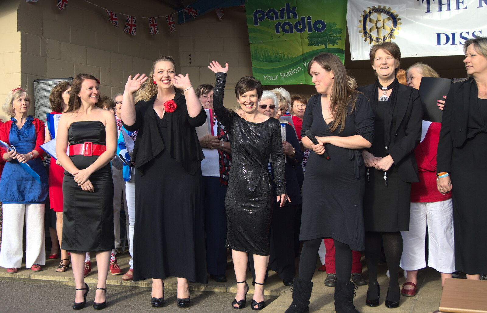 The Military Wives do a wave from Grandad's Gaff and Music in the Park, Diss, Norfolk - 16th June 2012