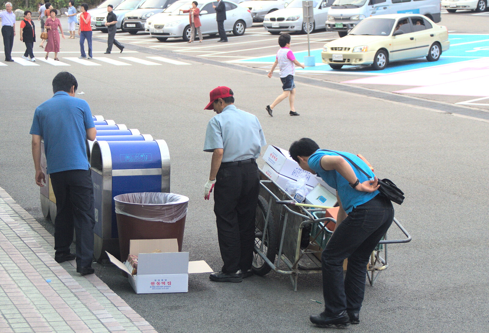 The bin cleaners appear from Working at Samsung, and Geumosan Mountain, Gumi, Gyeongsangbuk-do, Korea - 24th June 2012